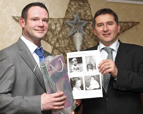 'Grain Trade member Peter Davison was the winner of the NIGTA Name the baby competition, where you had to guess names and put captions to photographs of members as children. Peter is pictured getting his prize from Declan Billington, President, NIGTA.