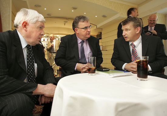 Alan Ashenhurst left and Gordon Donaldson, right have a discussion with Seamus Carr from Vion after he spoke at the NI Grain Trade Association meeting.